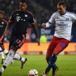 getty images; Jerome Boateng (li) verletzte sich später im Spiel gegen den HSV schwer
